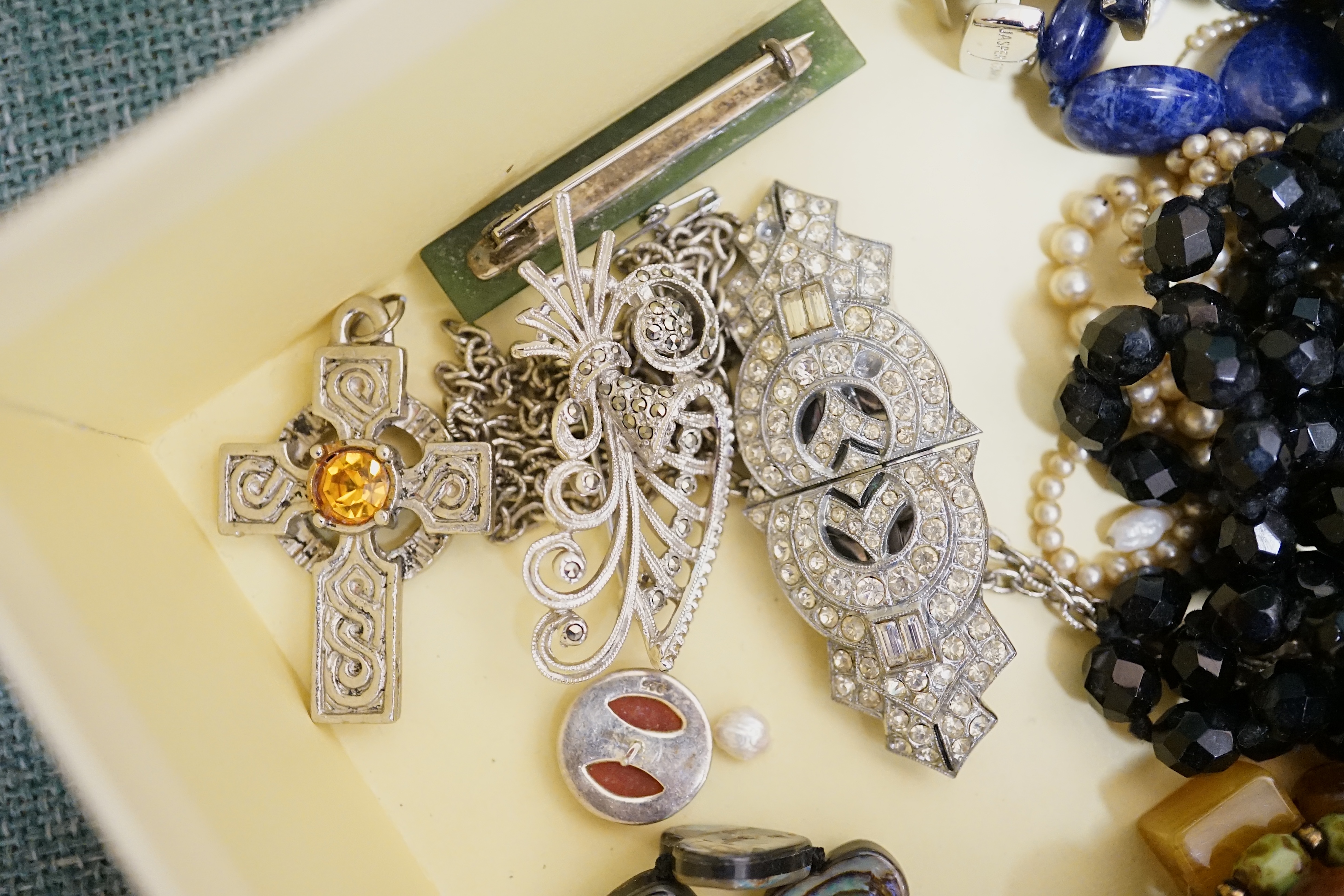 A quantity of assorted costume jewellery. Condition - poor to fair to good